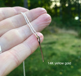 Small silver needle charm