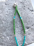 Beaded necklace with alder cone