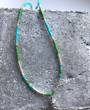 Beaded necklace with alder cone