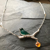 Bird necklace with dangling flower