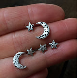 Silver crescent moon and star earrings