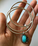 Three bangle bracelet set with gemstone charm