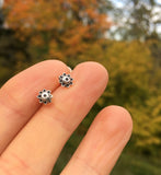 Silver flower studs