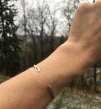 Silver sewing needle cuff bracelet