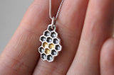 Geometric honeycomb pendant